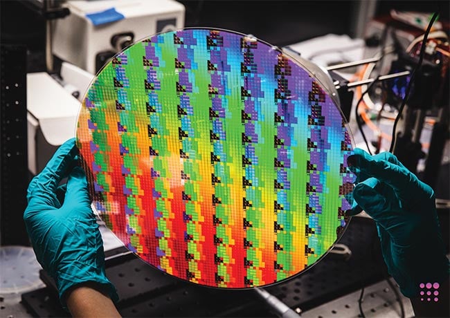 The high-volume lithography processes on which semiconductor manufacturing has relied for decades can be adapted to fabricate the nanosurface structures of metaoptics. A 12-in. Metalenz wafer, for example, encompasses about 5000 metaoptics. Courtesy of Metalenz.