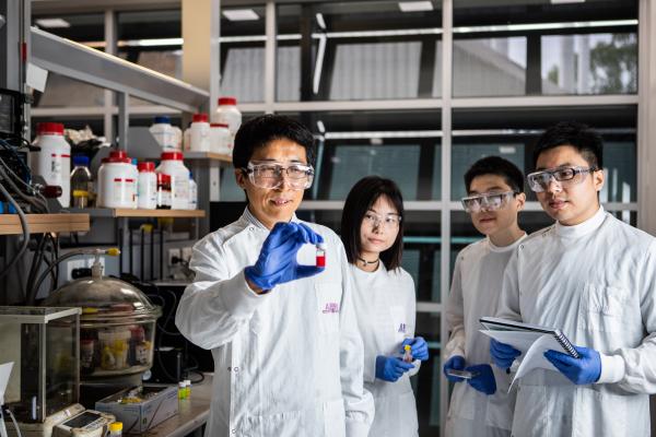 (l) to (r): Professor Lianzhou Wang and researchers Shanshan Ding, Mengmeng Hao, and Yang Bai. Courtesy of the University of Queensland. Quantum dot solar cells research.