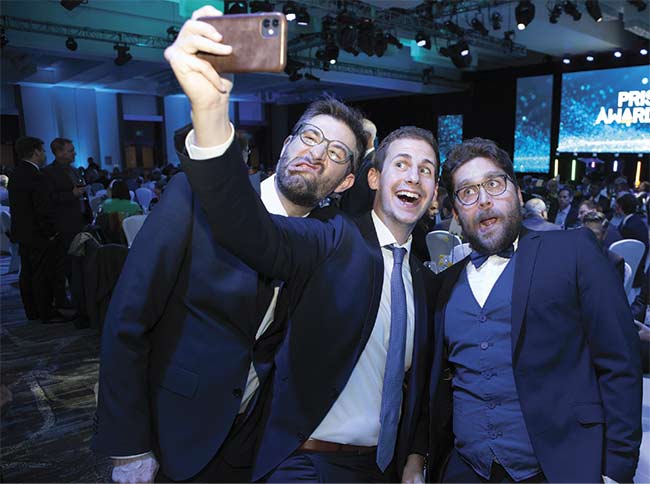 The Leica Geosystems team, two-time Prism Award winners and 2020 finalists, pose for a selfie before the ceremony. Courtesy of Joey Cobbs Photography.