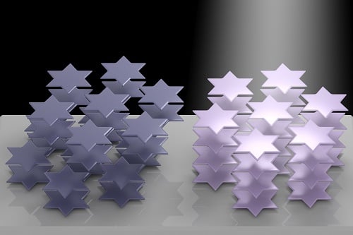 Atoms in the crystal lattice of tantalum disulfide arrange themselves into six-pointed stars that can be manipulated by light, according to Rice University researchers. The phenomenon can be used to control the material's refractive index. It could become useful for 3D displays, virtual reality and in lidar systems for self-driving vehicles. Courtesy of Weijian Li, Rice University.