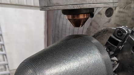 Wear parts like this stone crusher tooth with an outer diameter of about 140 mm are restored with the LMD process. Thanks to AI, the processes for repairing irregular surfaces will be optimized. Courtesy of Apollo Machine and Welding Ltd., Canada.