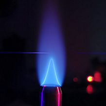 The researchers developed a Raman-based analytical instrument that uses an ultrafast laser for precise temperature and concentration measurements of hydrogen. They used it to study the hydrogen flame, shown here. The research supports further research into greener, more sustainable fuels for use in spacecraft and airplanes. Courtesy of Alexis Bohlin, Luleå University of Technology.