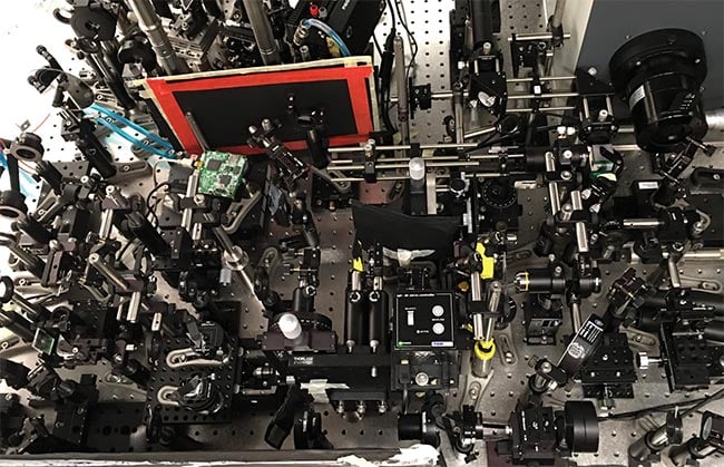 Caltech’s compressed ultrafast spectral photography (CUSP) system achieved a new imaging speed record of 219 trillion fps. Courtesy of Caltech.
