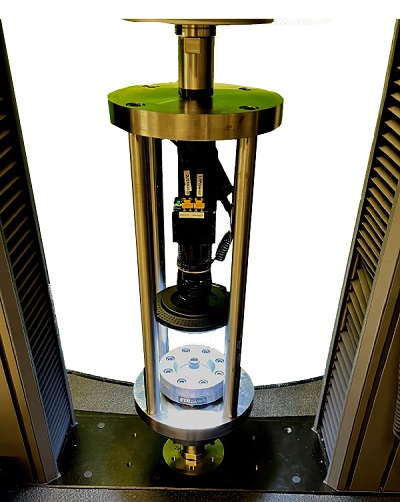 Experimental setup of the axisymmetric V-bending device. Courtesy of ETH Zurich.