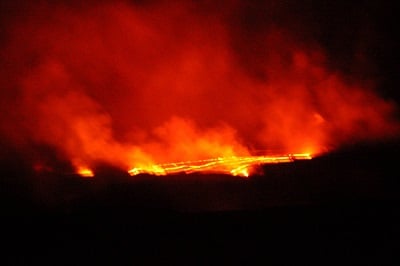 Kilauea lava lake captured at night, with the relatively substantial gaseous emissions clearly visible. Courtesy of Tom Pering.