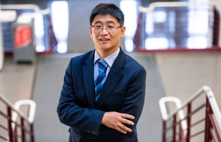 Professor Tao Xu is helping to spearhead a three-party agreement to bring thin-film solar cells to market. The cells feature a lead-sequestration layer that eliminates concerns of hazardous, toxic lead leakage. Courtesy of NIU.