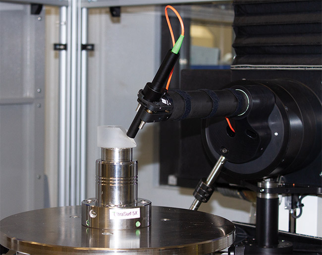 Measuring a freeform optic with noncontact metrology. Courtesy of OptiPro.