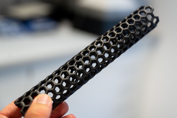 A 3D-printed model of a carbon nanotube, the main building block for the new biosensors. Unlike this 3D-printed model, the nanotubes that are used for the biosensors are 100,000 times thinner than a human hair. Courtesy of RUB, Marquard.