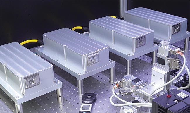 Deep-ultraviolet (DUV) lasers being tested in production. Although solid-state DUV lasers are subject to deterioration of their conversion crystals, recent developments at IPG Photonics have demonstrated significant improvements of crystal lifetime. The result is higher stability of beam quality parameters.  Laser lift-off (LLO) techniques are sensitive to the laser’s stability, beam homogeneity, pulse overlap, and pulse edge effects, which requires uniform delivery of beam energy (bottom). Courtesy of IPG Photonics.