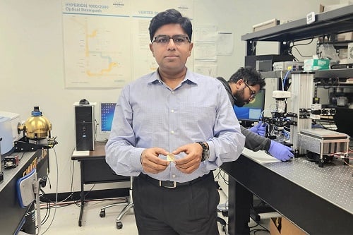 UCF NanoScience Technology Center professor Debashis Chanda shows the plasmonic platform he developed that significantly improves the detection of the chirality of molecules. Courtesy of the University of Central Florida.