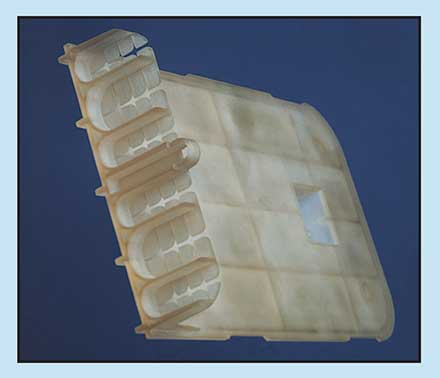 A 500-mW diode-pumped solid-state laser operating at 100 kHz replaced the typical CW argon-ion laser in a 3D Systems' SLA-500 stereolithography system to create this part from Somos 7120 resin.