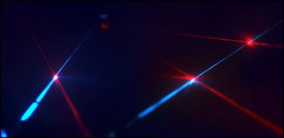 An artist’s impression of distributed qubits (the bright spots) linked to each other via photons (the light beams).