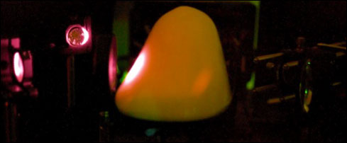 Image of laser light scattering through a breast model to demonstrate the University of Exeter technique. 
