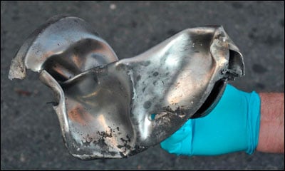 Boston Marathon bomb scene picture taken by investigators shows the remains of an explosive device.