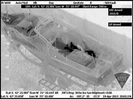  The feet of Boston Marathon bombing suspect Dzhokhar Tsarnaev are clearly visible in this infrared imaging shot from a Massachusetts State Police video.