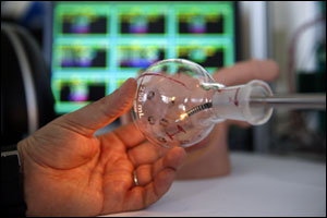 The telerobotic system created by engineers and doctors at Vanderbilt and Columbia universities is only 5.5 mm in diameter and is shown in a glass flask about the size of a human bladder. 