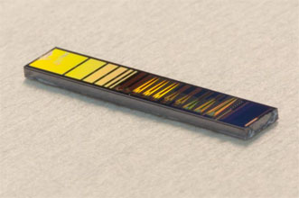 The silicon photonic chip features planar waveguides.