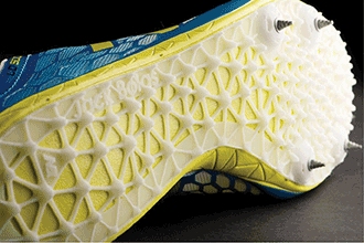 The sole of a running shoe with a custom spike plate designed based on an individual runner’s data and manufactured with plastic laser sintering from EOS.