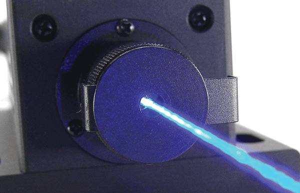 A 473-nm blue beam is the primary channelrhodopsin wavelength, which, when used in free space, can be applied to microscopy applications (through the scope objective) in vitro. 