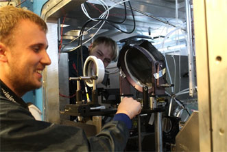 Technicians work on the Rutherford petawatt laser. 