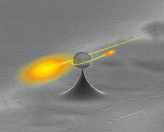In this artist's rendering, a single photon is separated from a light pulse by a single atom near a nanofiber-coupled microresonator.