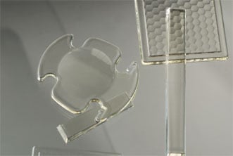 Plastic optical components designed by Edmund Optics and printed by Luxexcel.