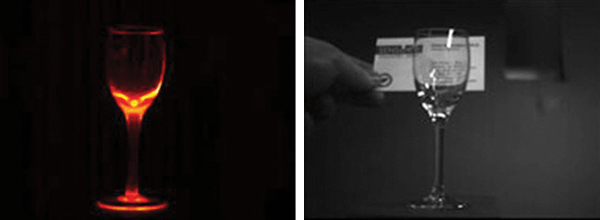 a hot wine glass false-color image of SWIR signals calibrated to temperature, showing the hottest part of the glass to be about 3300 °C.