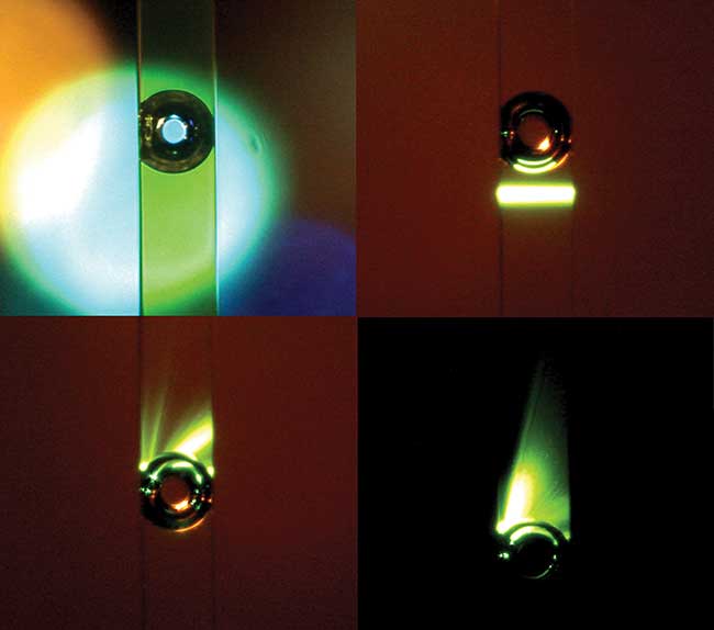 A large vapor bubble in a 250-µm flow cytometer microchannel caused by absorption of high-power green light by fluorescein dye. 