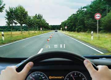 Lane departure warnings appear when the driver goes off course.