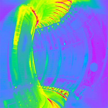 IR camera view of the inside of the JET fusion vessel.