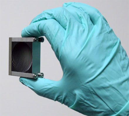 Researchers have used an array of stacked plates to make a lens for terahertz radiation.