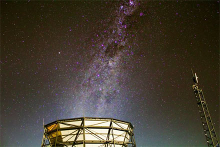 The Milky Way's galactic plane rises above the Atacama Cosmology Telescope.