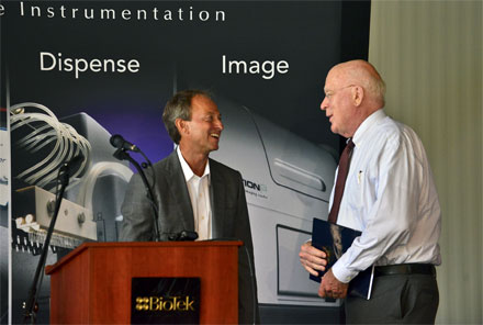 Briar Alpert, BioTek president and CEO (left) with Vermont Senator Patrick Leahy at a company-wide event to celebrate the expansion.