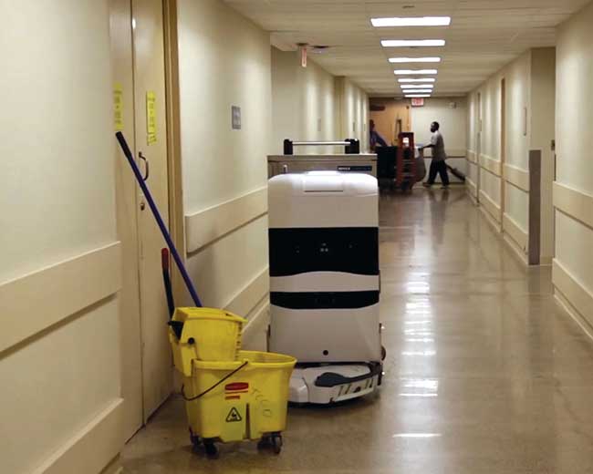 An autonomous mobile robot navigates around an obstacle.