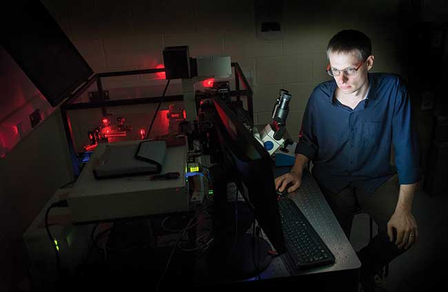 Alistair Curd, a researcher in the Peckham group working on the 3D STORM/PALM setup, at the University of Leeds Astbury Center. 