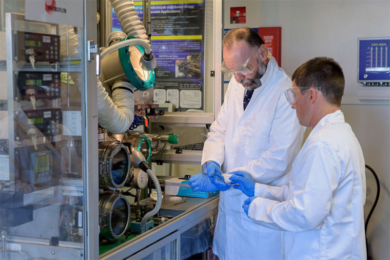 Abdallah Ougazzaden, director of Georgia Tech Lorraine in Metz, France and Chris Bishop, a researcher at Institut Lafayette, example a sample being processed in a lab at Georgia Tech Lorraine. 