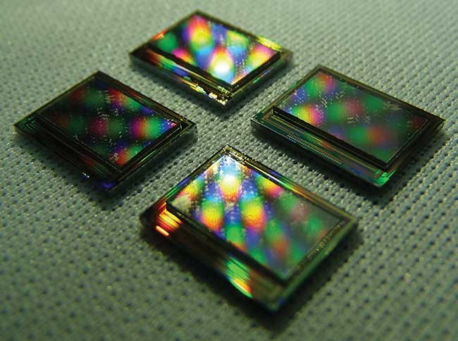 A hybridized active matrix GaN 873 × 500-pixel microdisplay at 10-µm pitch.