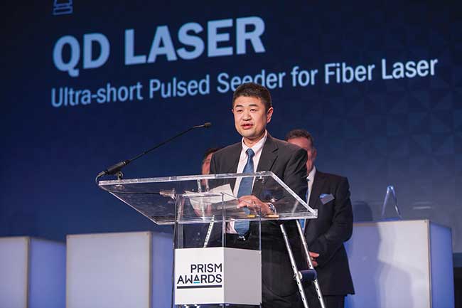 Engineers from QD Laser accept the 2017 Industrial Laser award for their Ultra-short Pulsed Seeder for Fiber Laser.