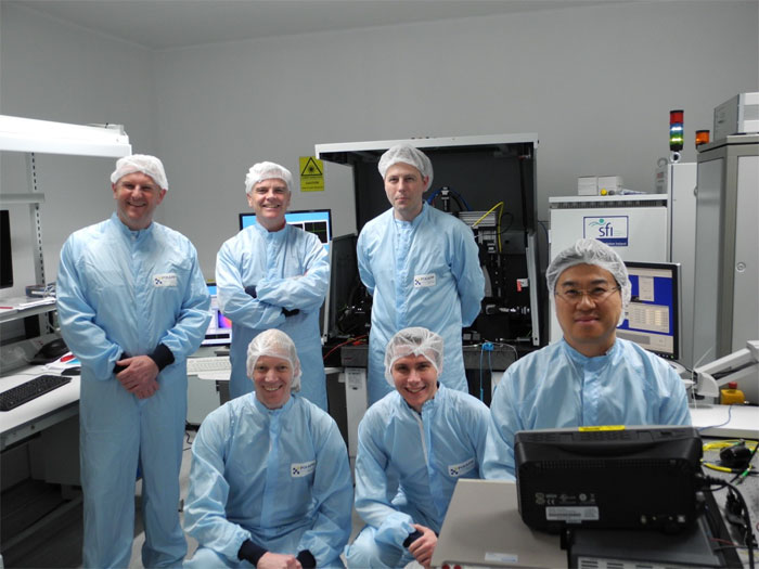 PHIX Photonics Assembly engineers receive training at Tyndall Institute packaging laboratories.