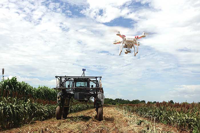 A UAV copter surveys a field for plant height and shapes at the same time as a lidar (on spray tractor). 