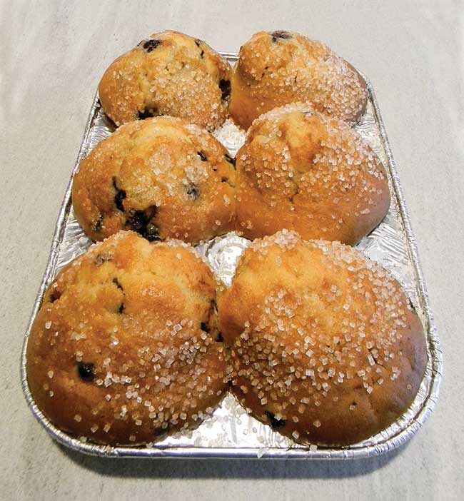 A tray of store-bought blueberry muffins