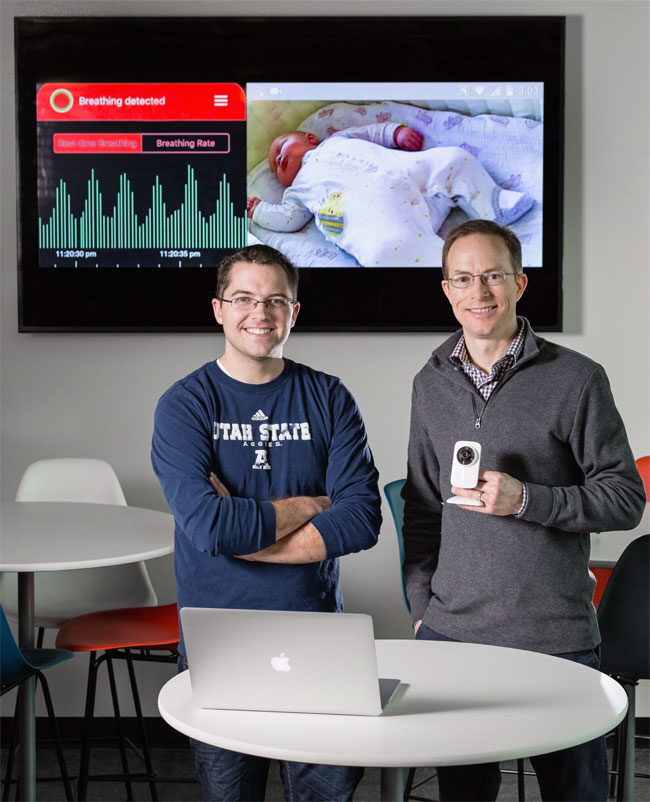 USU alumnus and CEO, Photorithm Inc. Nate Ruben (left) and Professor Jake Gunther, right, remote sensor for monitoring heart and breathing rates. Utah State University.