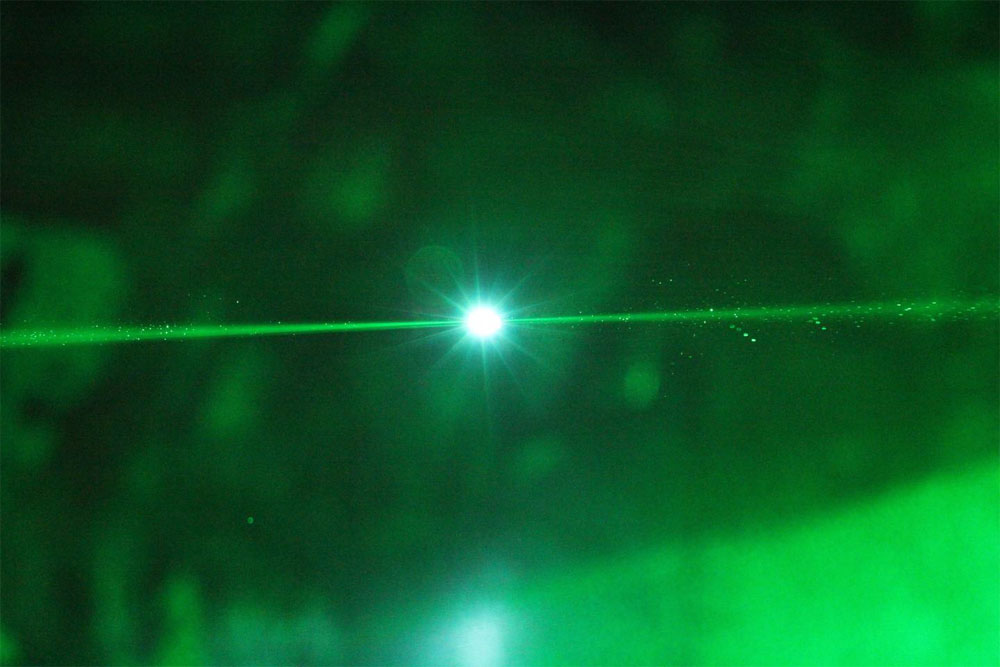 The water droplet was analyzed with laser induced breakdown spectroscopy, which uses a high energy laser pulse to vaporize the sample and generate a plasma. The light emitted by the plasma can be detected and used to identify the chemical components of the sample. Courtesy of Victor Contreras, Instituto de Ciencias Físicas UNAM.