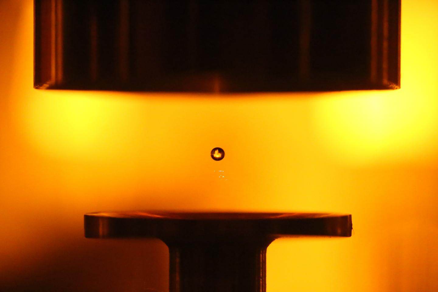 Researchers used sound waves to levitate droplets of water. This approach allows the water to evaporate, which concentrates the sample for spectroscopic detection of harmful heavy metal contaminants such as lead and mercury in water. Courtesy of Jairo Peralta and Victor Contreras, Instituto de Ciencias Físicas UNAM.
