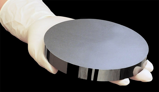 Figure 1. Lens blank made from chalcogenide material. Courtesy of LightPath Technologies.