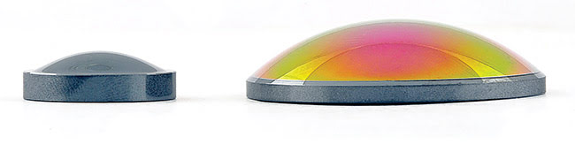 Figure 2. Precision-molded, uncoated BD6 chalcogenide lens (left) next to a coated BD6 diamond-turned lens (right). Courtesy of LightPath Technologies.