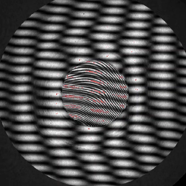 Figure 1. A 1-cm-thick plane-parallel substrate with a 250-µm-thin plate cemented to it, causing a confused interference pattern that is impossible to measure with a laser Fizeau interferometer. Courtesy of Apre Instruments Inc. 