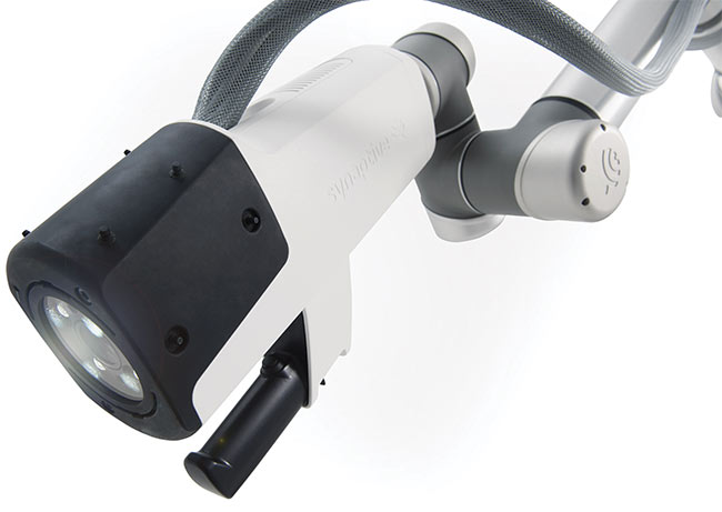  Synaptive Medical’s Modus V robotic microscope can be manipulated quickly and with minimal effort using the handle seen here. Courtesy of Synaptive Medical. 