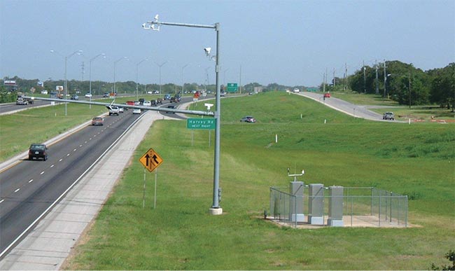 A testbed for vision traffic systems. The cameras under test are mounted on a pole above State Highway 6 in Texas. Courtesy of Dan Middleton/Texas A&M Transportation Institute.