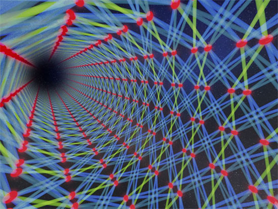 The researchers have produced light beams with special quantum mechanical properties (squeezed states) and woven them together using optical fiber components to form an extremely entangled quantum state with a 2D lattice structure, also called a cluster state. The researchers compare this state to a myriad of colored threads woven together into a patterned blanket. Courtesy of Jonas S. Neergaard-Nielsen.